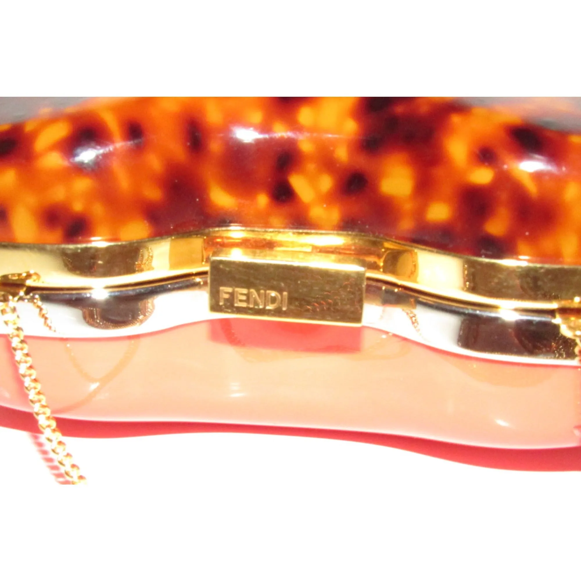 Retro, Fendi two way- clutch or cross body/shoulder clam shell style purse made of red & tortoise shell Lucite with a gold chain strap